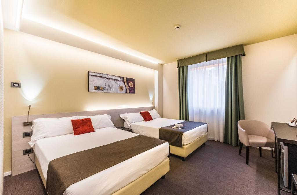 Postel nebo postele na pokoji v ubytování Antony Hotel - Venice Airport