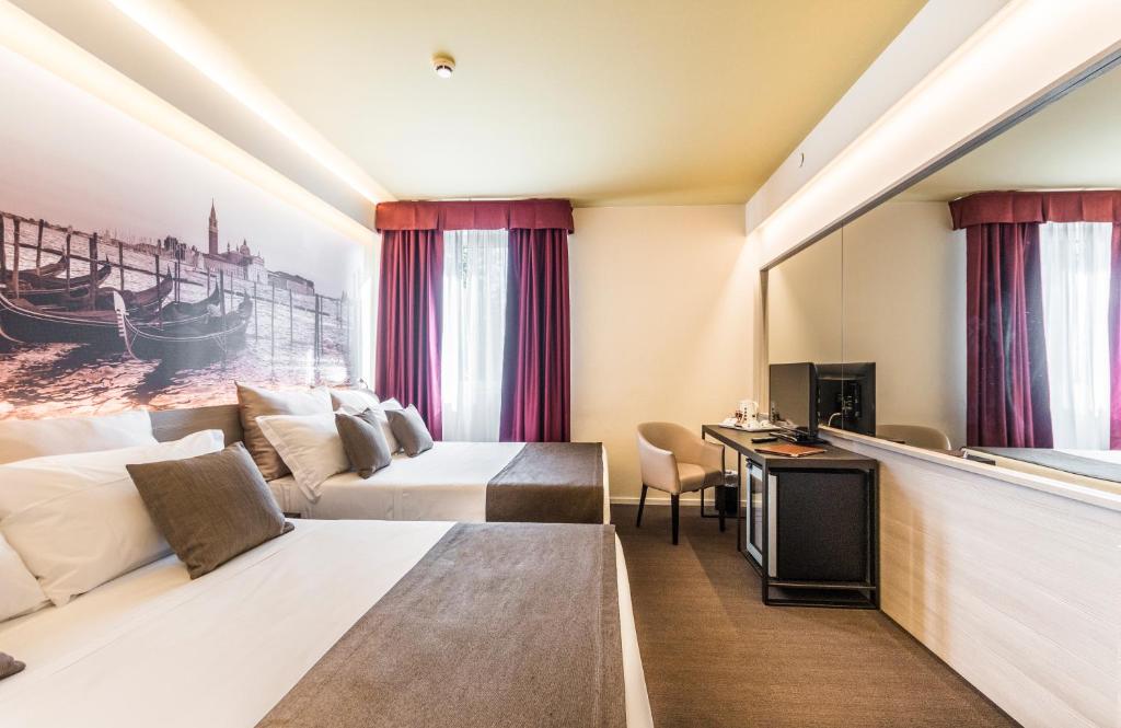 Postel nebo postele na pokoji v ubytování Antony Hotel - Venice Airport