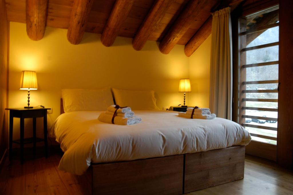 Postel nebo postele na pokoji v ubytování Pietre Gemelle Resort