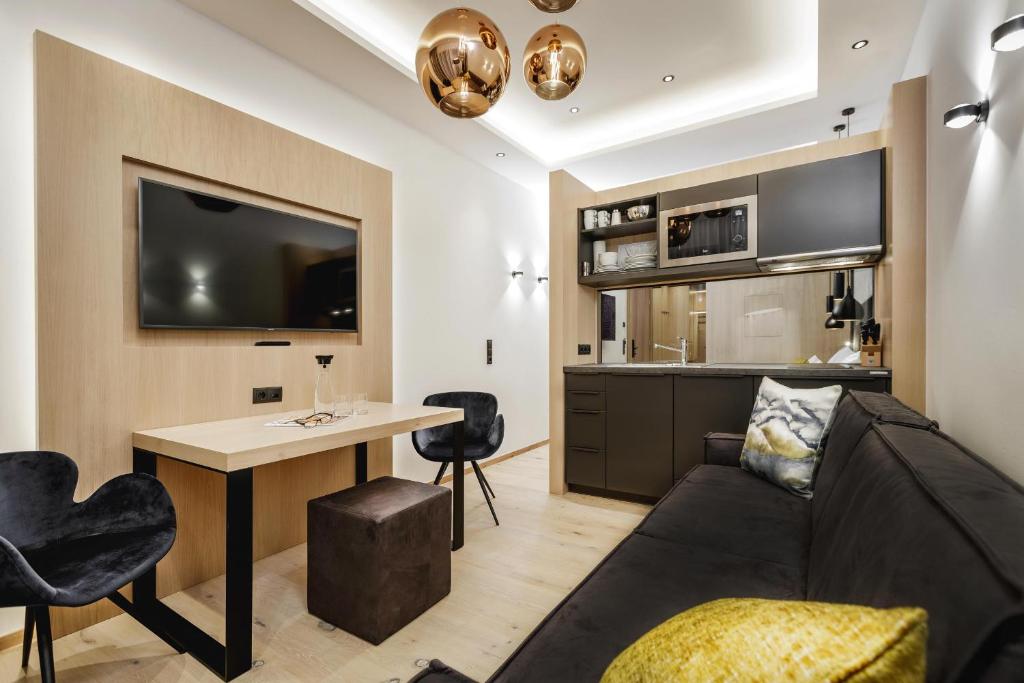 Kuchyňa alebo kuchynka v ubytovaní Alpinlounge Rätia Appartements