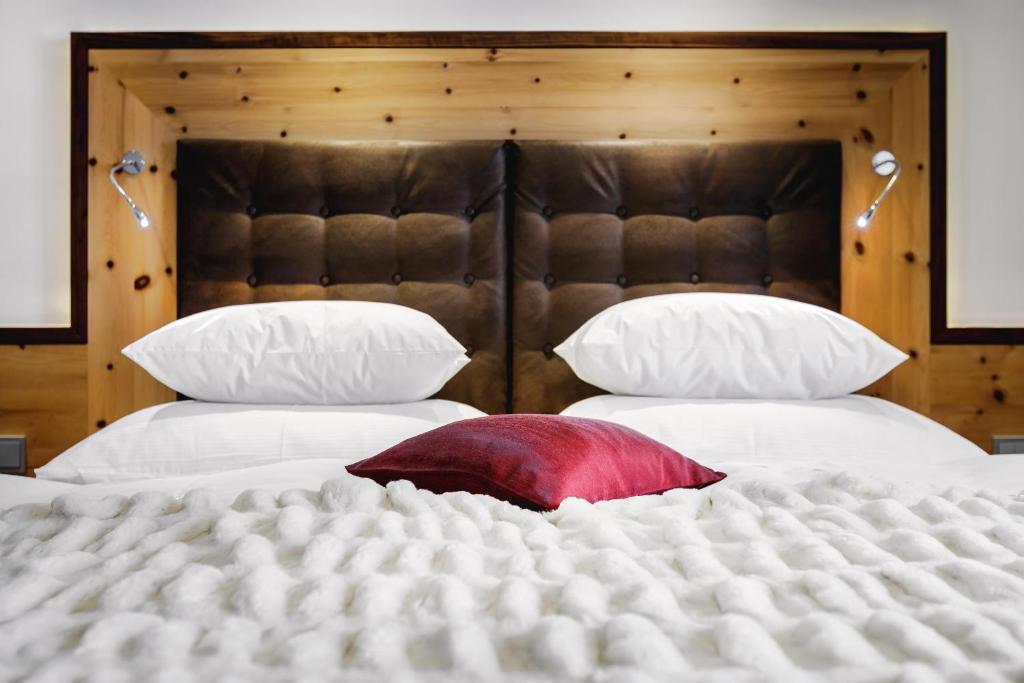 Posteľ alebo postele v izbe v ubytovaní Alpinlounge Rätia Appartements