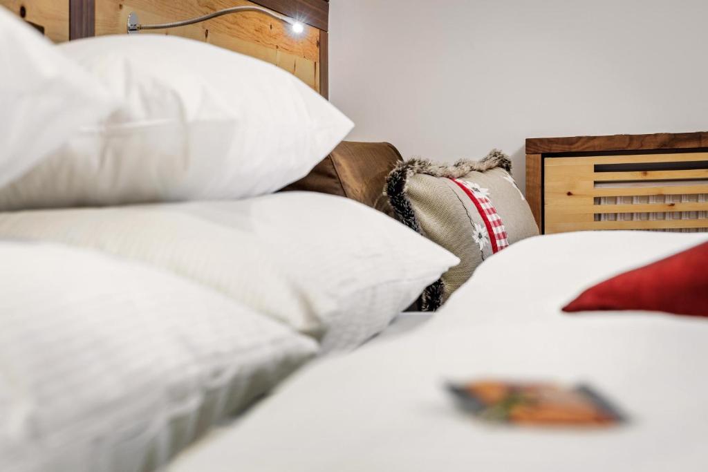 Posteľ alebo postele v izbe v ubytovaní Alpinlounge Rätia Appartements