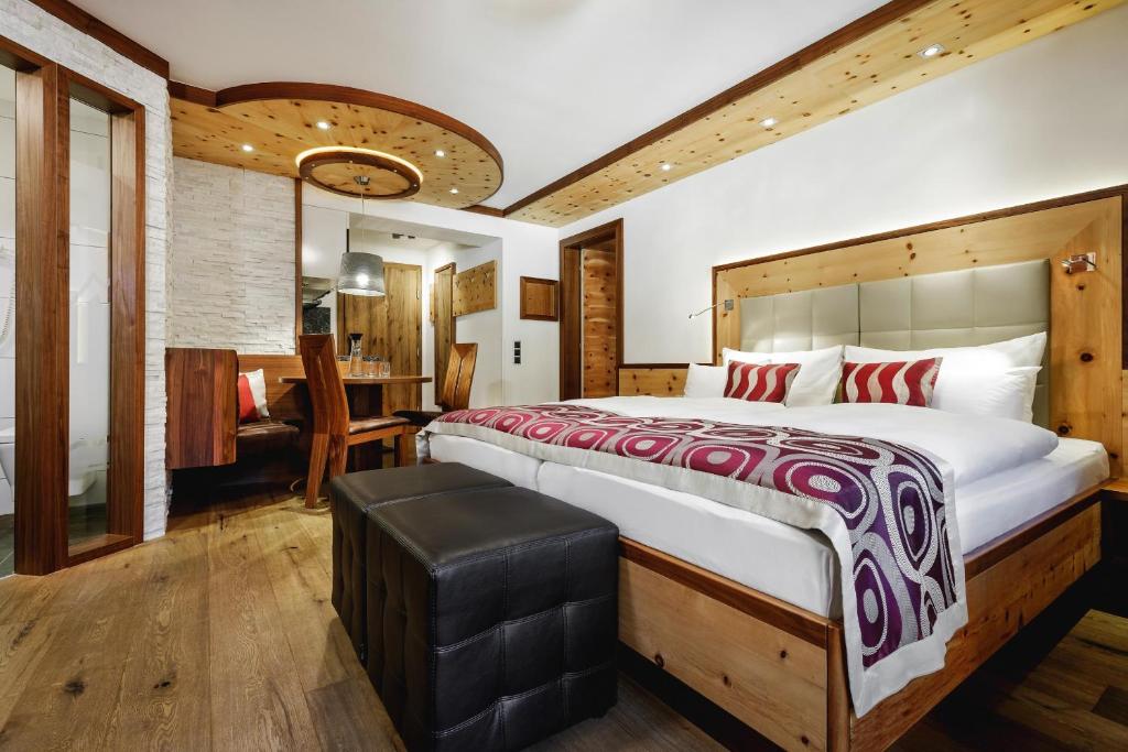 Posteľ alebo postele v izbe v ubytovaní Alpinlounge Rätia Appartements