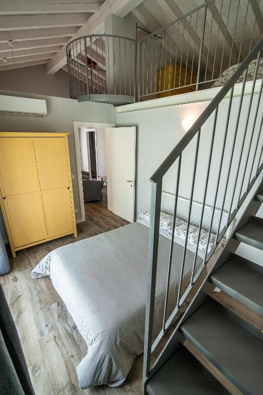 Postel nebo postele na pokoji v ubytování Particolari del Brenta