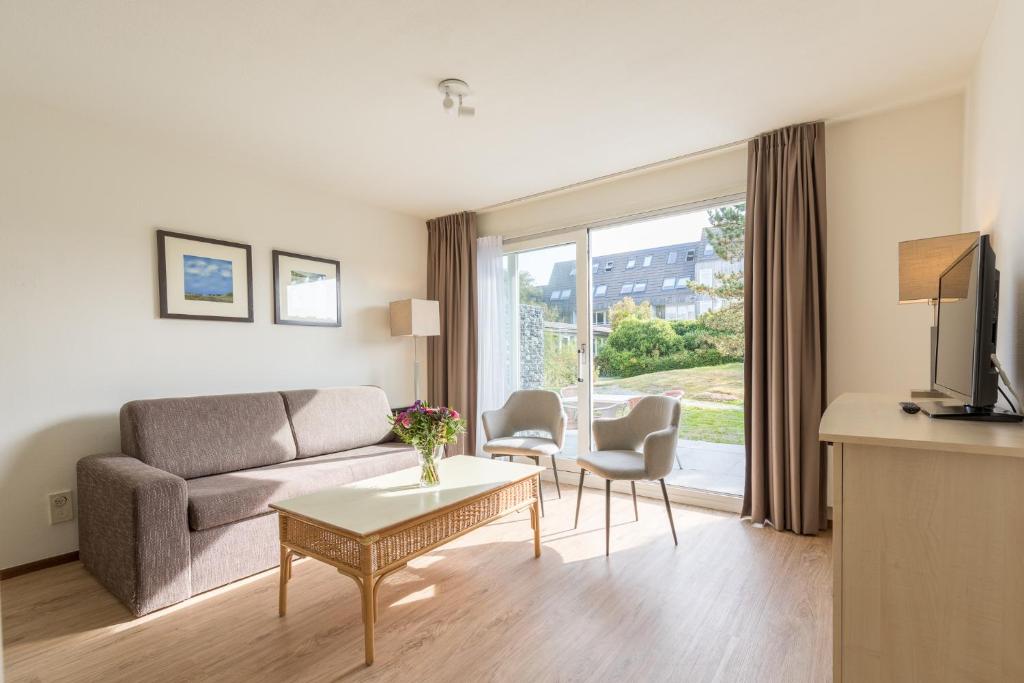 Posezení v ubytování Fletcher Hotel-Restaurant Amelander Kaap