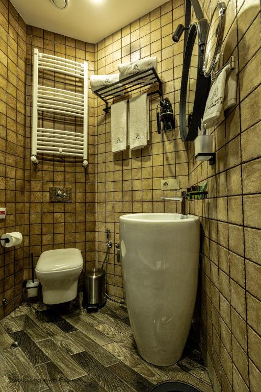 Koupelna v ubytování Hotel Adamo