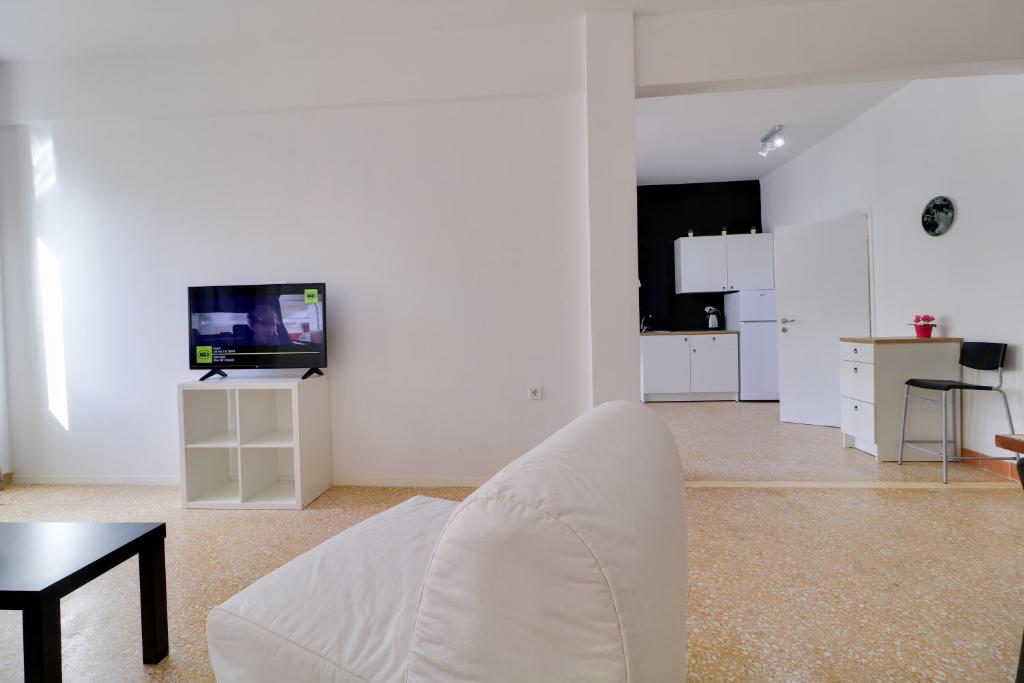 Kuchyňa alebo kuchynka v ubytovaní athens.apartotel.1
