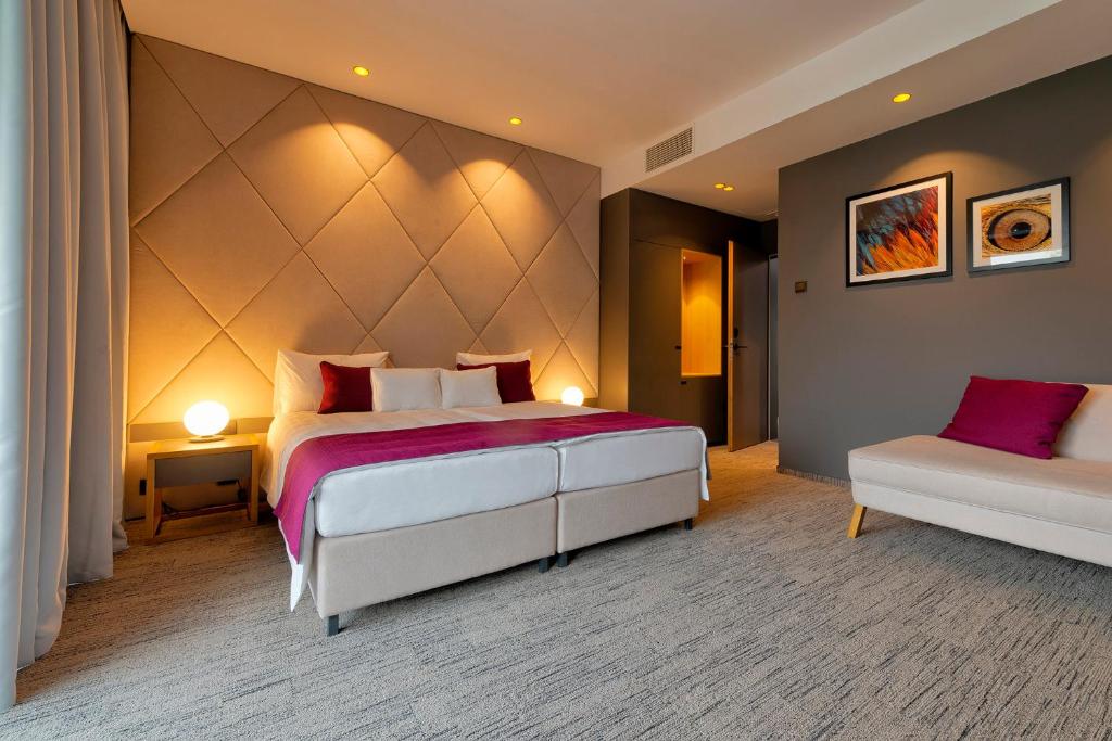 Posteľ alebo postele v izbe v ubytovaní Donautica Hotel & Restaurant