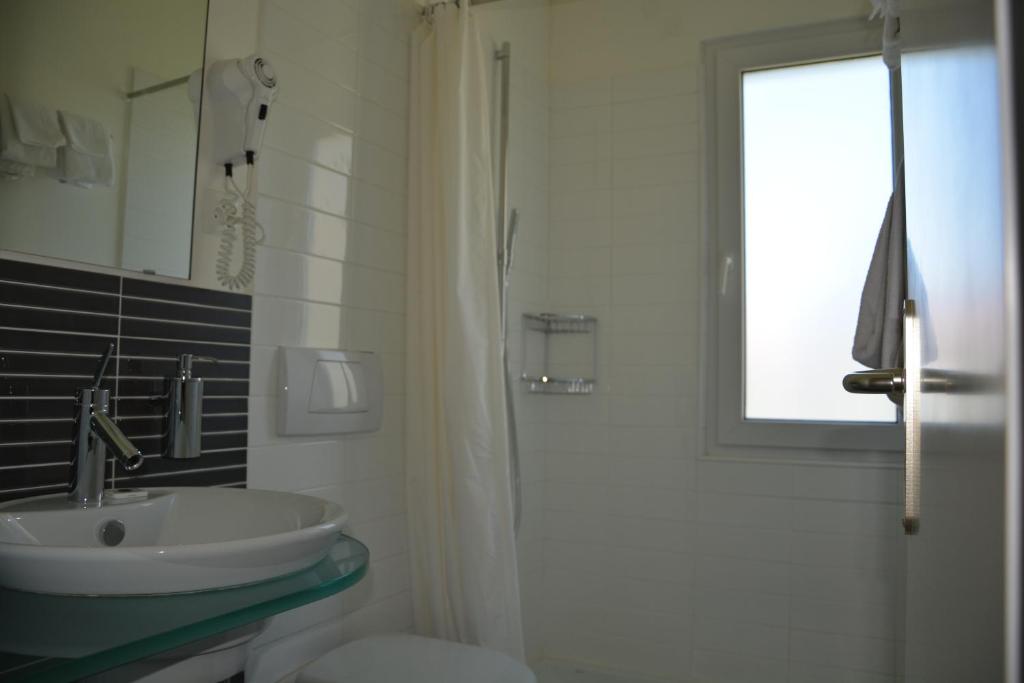 Koupelna v ubytování Hotel Villa Selva