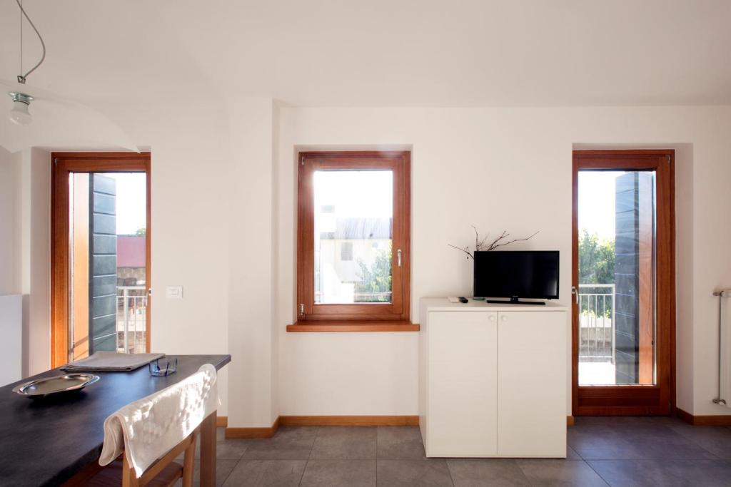 TV a/nebo společenská místnost v ubytování Agriturismo Mestroni