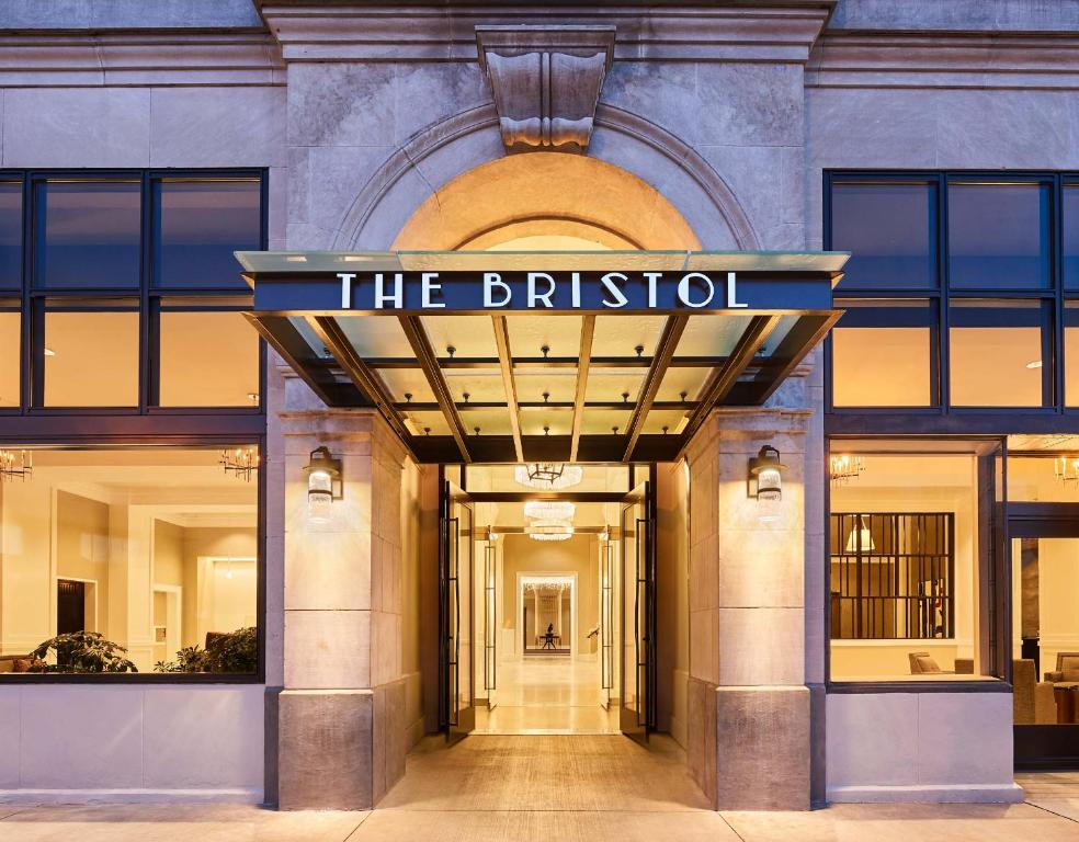 a building with a sign that reads the bristol at The Bristol Hotel in Bristol