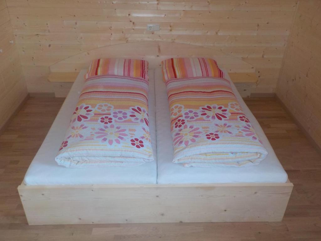 Postel nebo postele na pokoji v ubytování Berghütte Plafötschalm