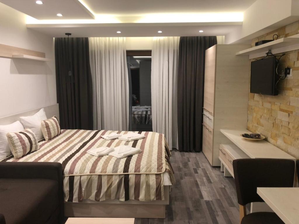 Cama ou camas em um quarto em Milmari Resort