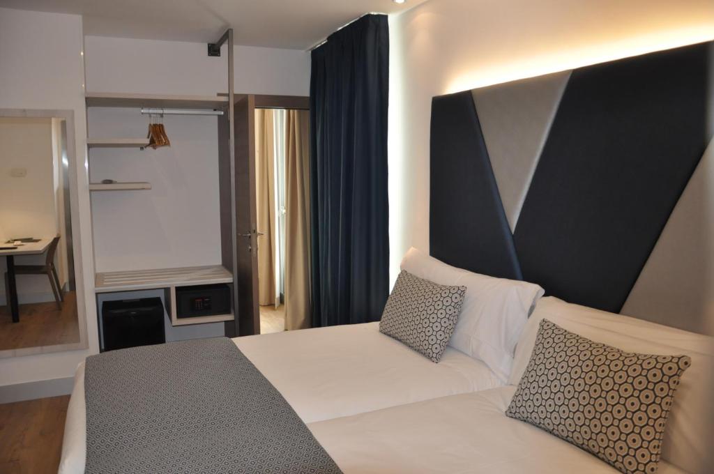 Postel nebo postele na pokoji v ubytování Hotel Selu