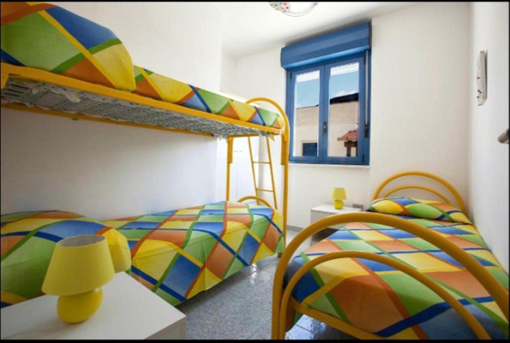 A bed or beds in a room at dimora la torre