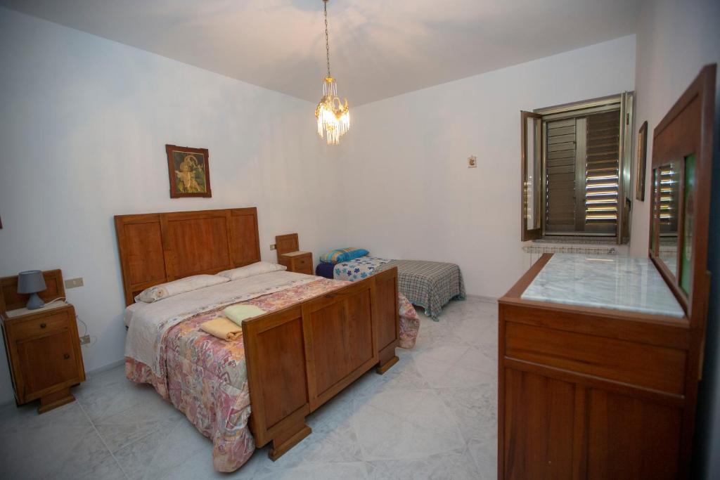 Postel nebo postele na pokoji v ubytování Rosa di Calabria