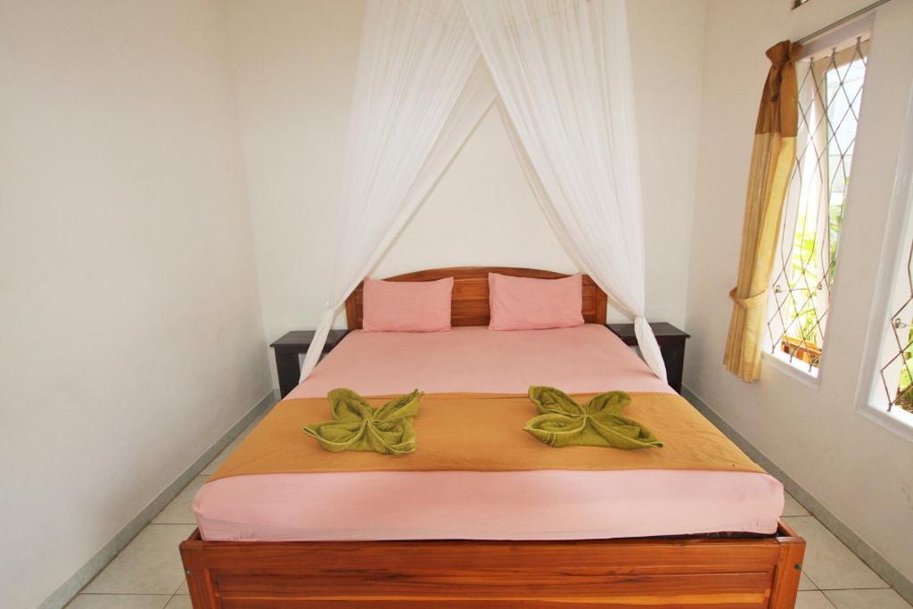 Postel nebo postele na pokoji v ubytování Manta Manta Guesthouse