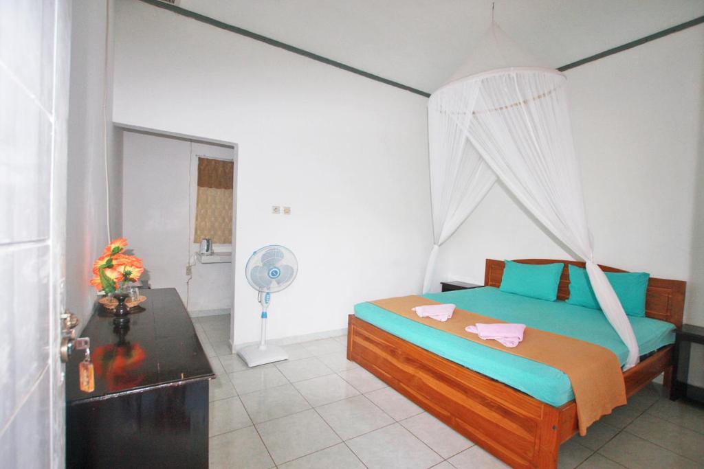 Postel nebo postele na pokoji v ubytování Manta Manta Guesthouse