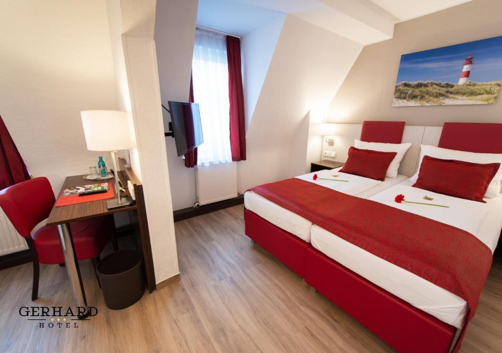 Postel nebo postele na pokoji v ubytování Hotel Gerhard