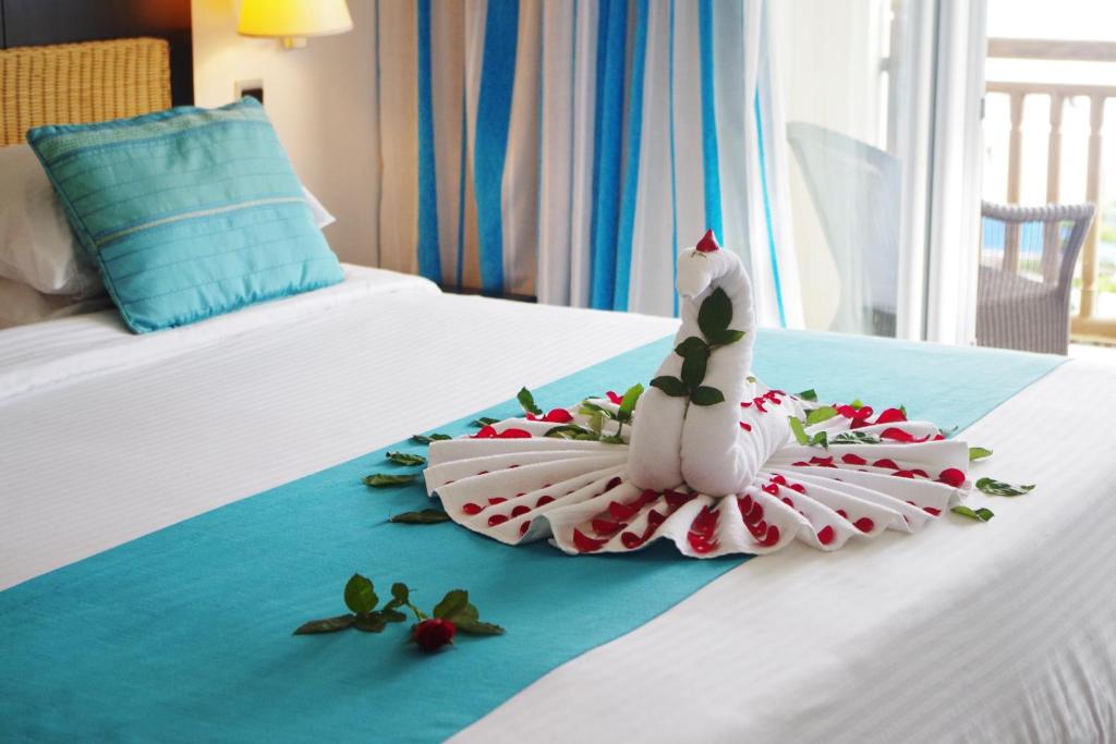 Postel nebo postele na pokoji v ubytování Pearle Beach Resort & Spa