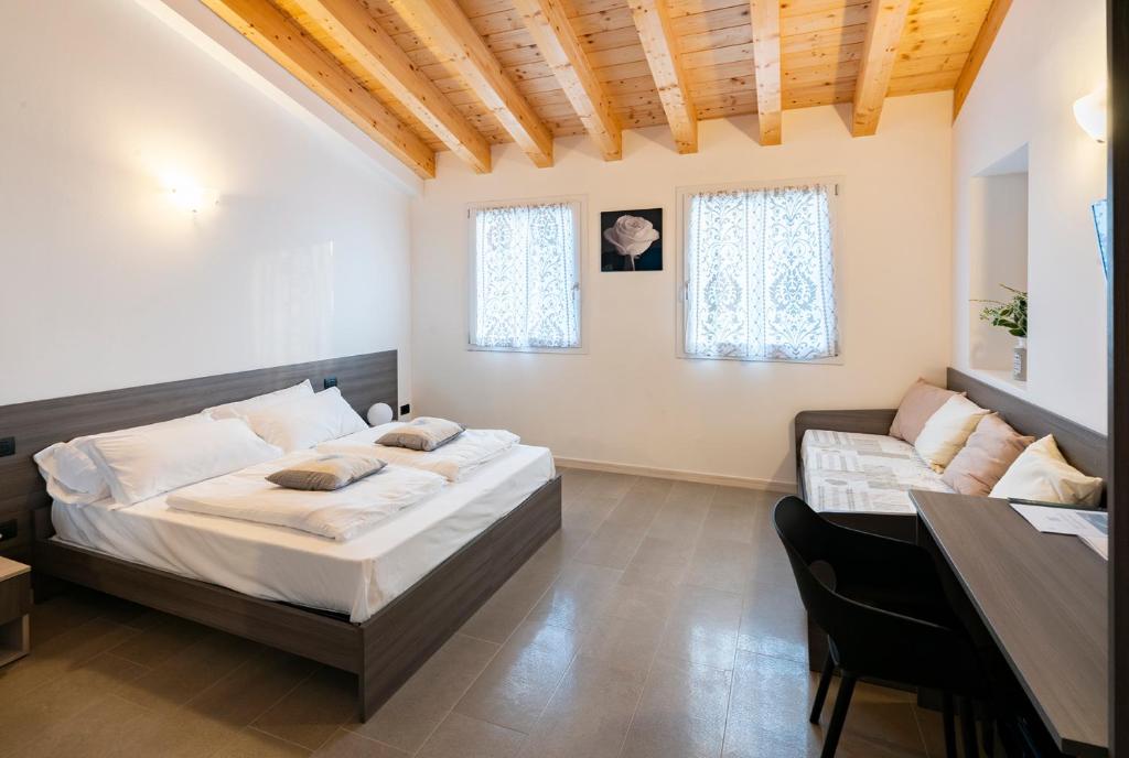 Postel nebo postele na pokoji v ubytování B&B Terrebianche