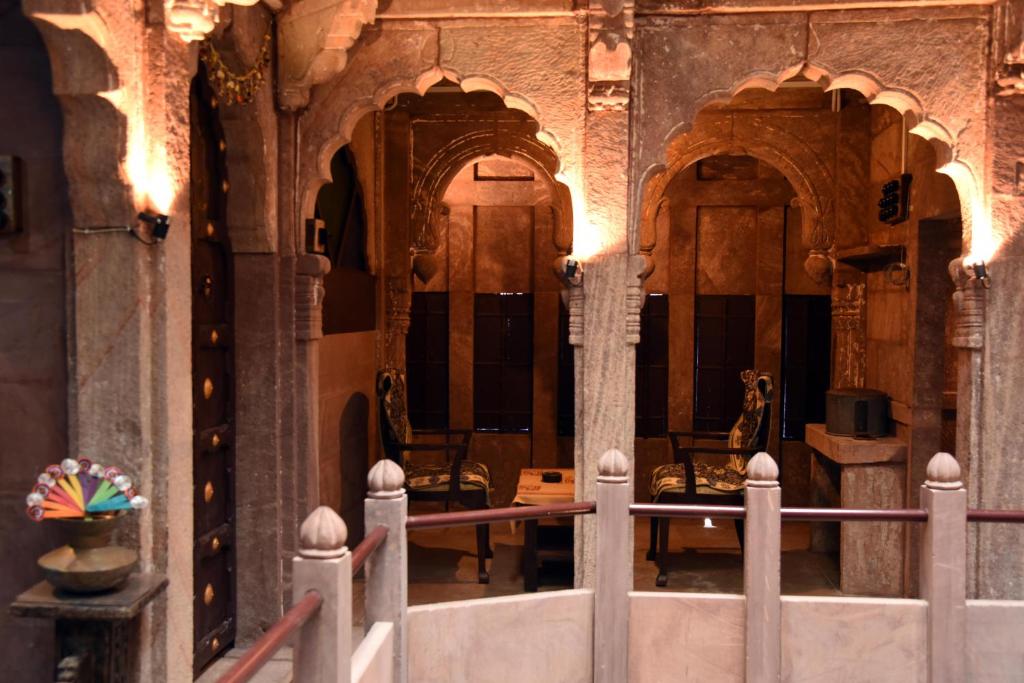 a view of a room with a fence in a building at The Thikana Heritage in Jodhpur