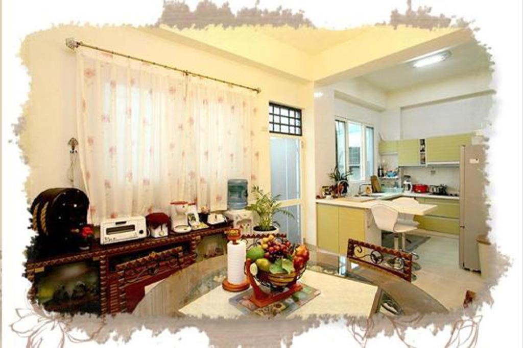 Een keuken of kitchenette bij &#x6C34;&#x6085;&#x96C5;&#x7BC9;&#x6C11;&#x5BBF; Shuiyue Guest House