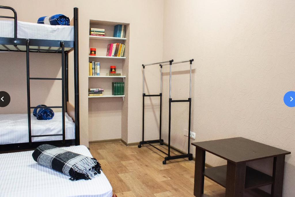 Postel nebo postele na pokoji v ubytování hostel Koleso