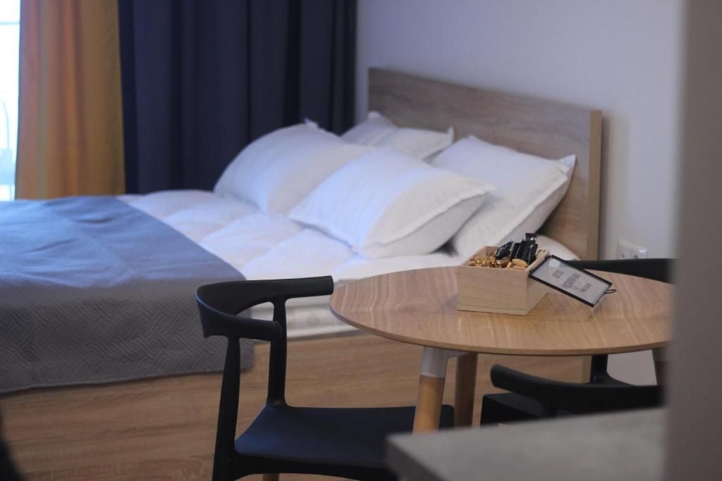 Ένα ή περισσότερα κρεβάτια σε δωμάτιο στο New Gudauri Room 526