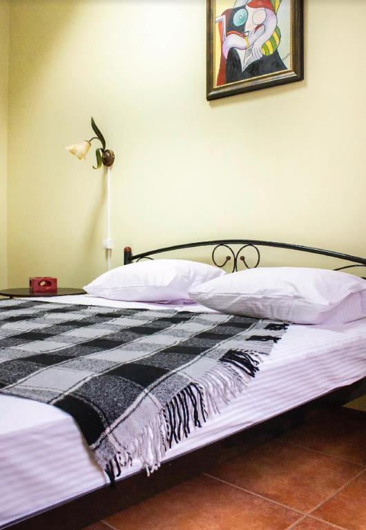 Postel nebo postele na pokoji v ubytování hostel Koleso
