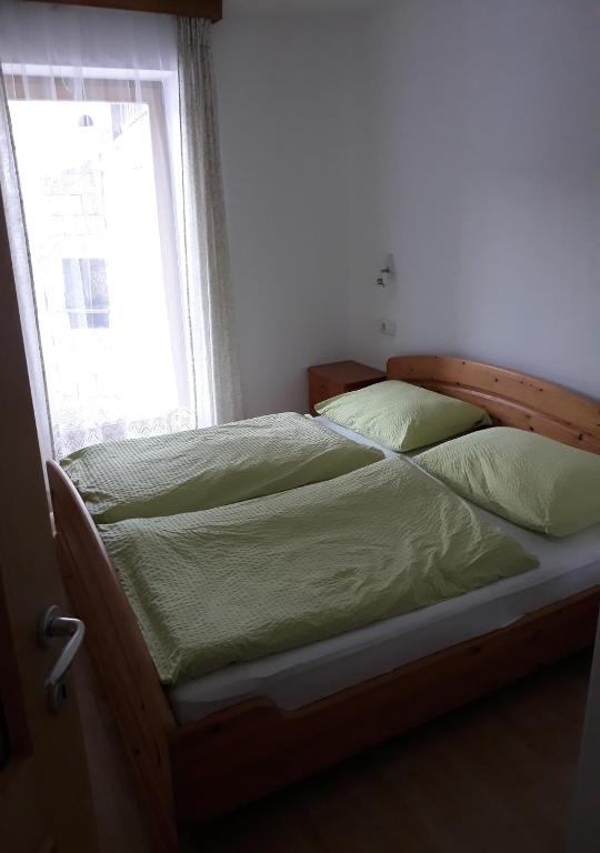 Posteľ alebo postele v izbe v ubytovaní Temblhof