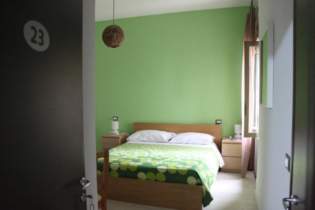 Postel nebo postele na pokoji v ubytování Hostel of the Sun