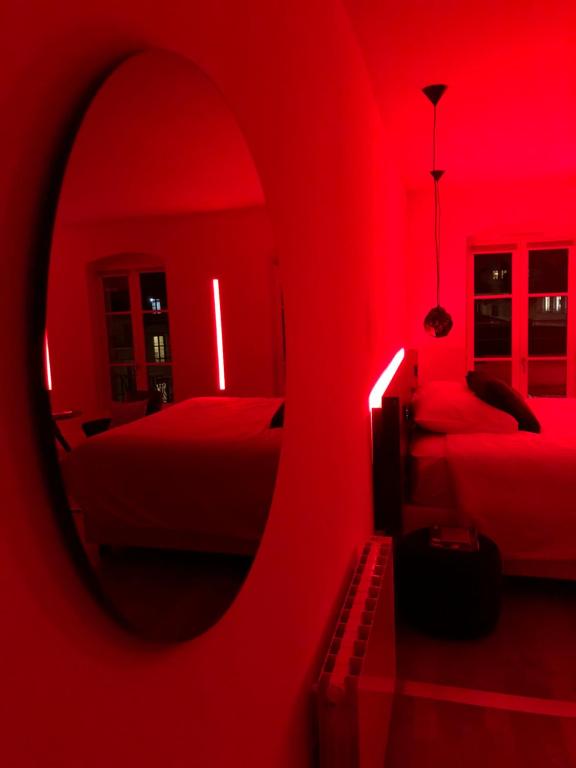 Postel nebo postele na pokoji v ubytování MiHotel Vieux Lyon
