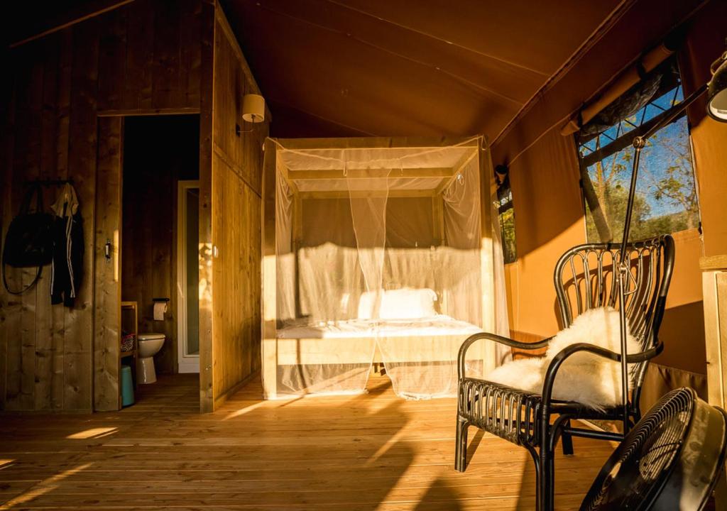 Postel nebo postele na pokoji v ubytování Lodge Holidays - Camping Gajole