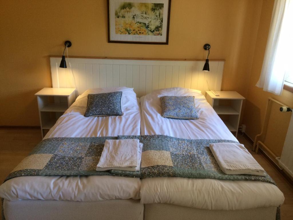 Postel nebo postele na pokoji v ubytování Hotell Paradis