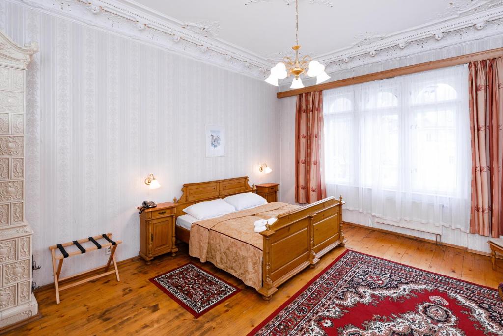 Postel nebo postele na pokoji v ubytování Hotel Heluan