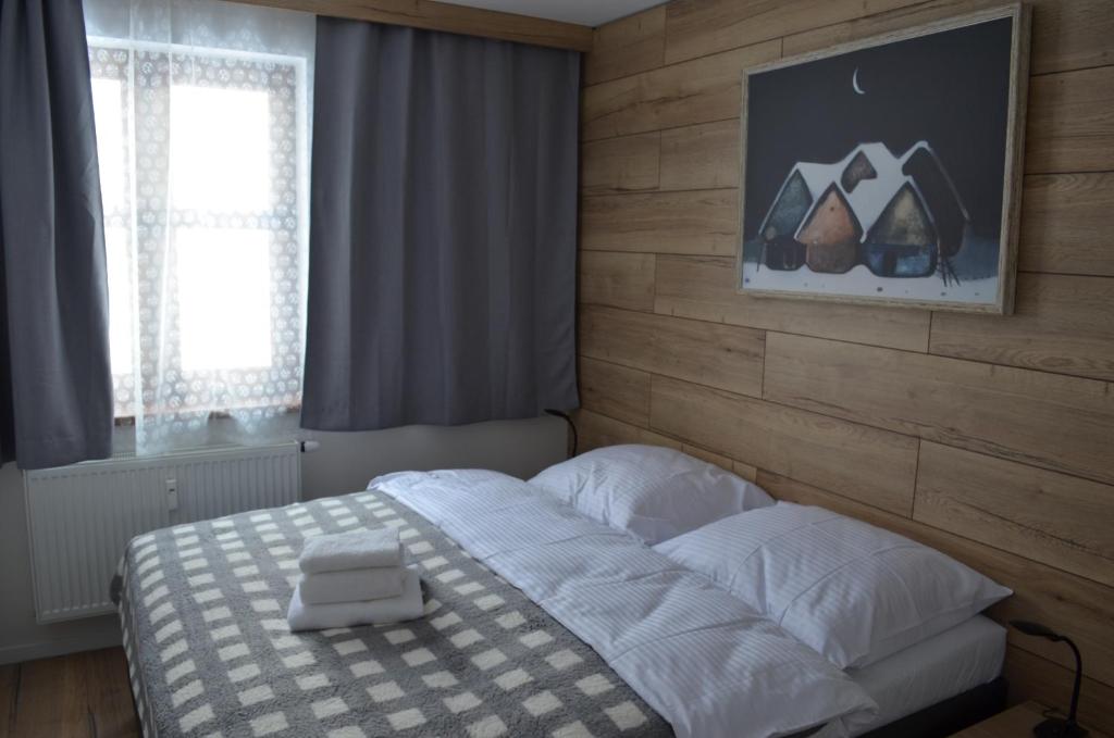 Posteľ alebo postele v izbe v ubytovaní Apartmán Mateo Jasná