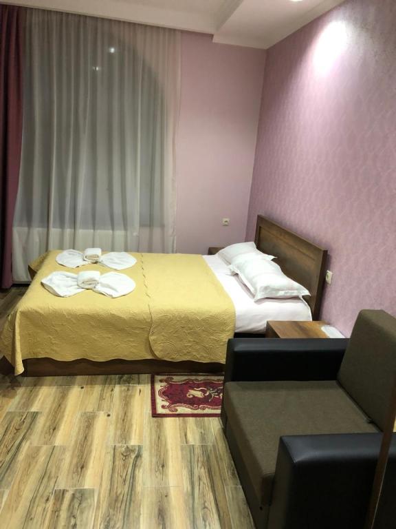 Postel nebo postele na pokoji v ubytování Chabarukhi