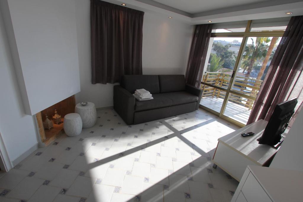 Posezení v ubytování For a Stay Salou Sol