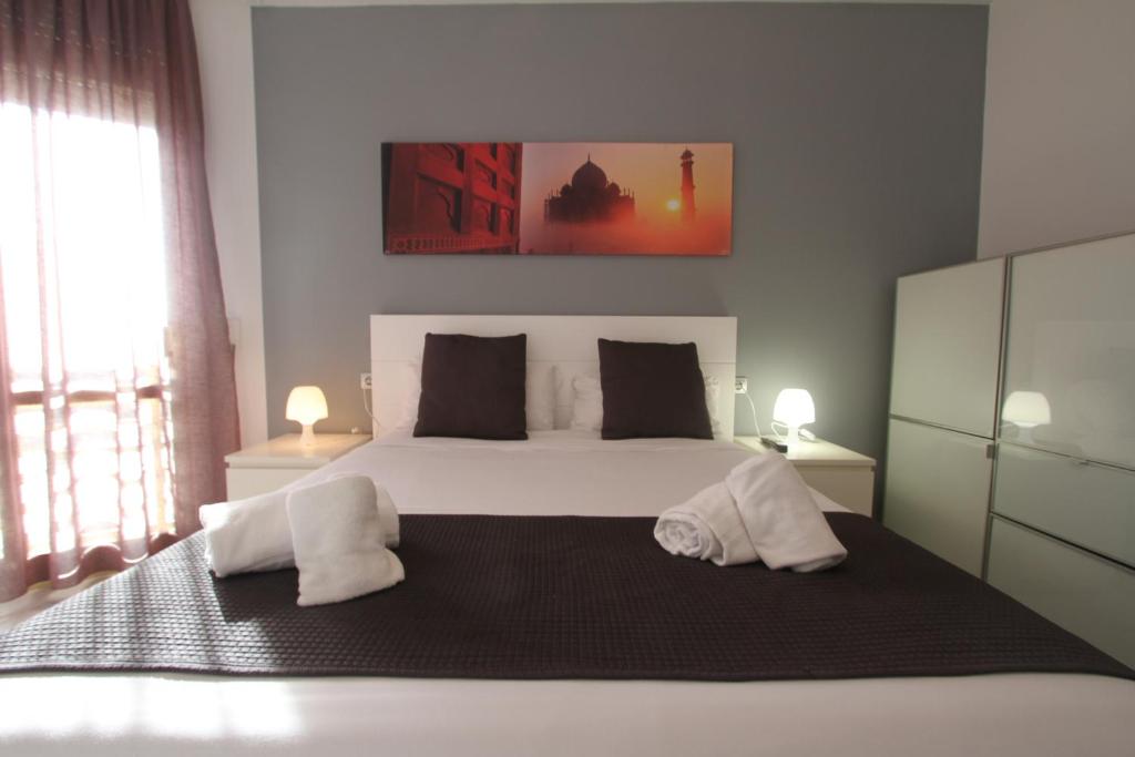 Postel nebo postele na pokoji v ubytování For a Stay Salou Sol
