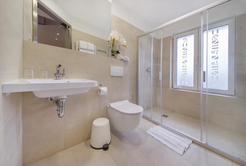 Koupelna v ubytování Dangė Hotel