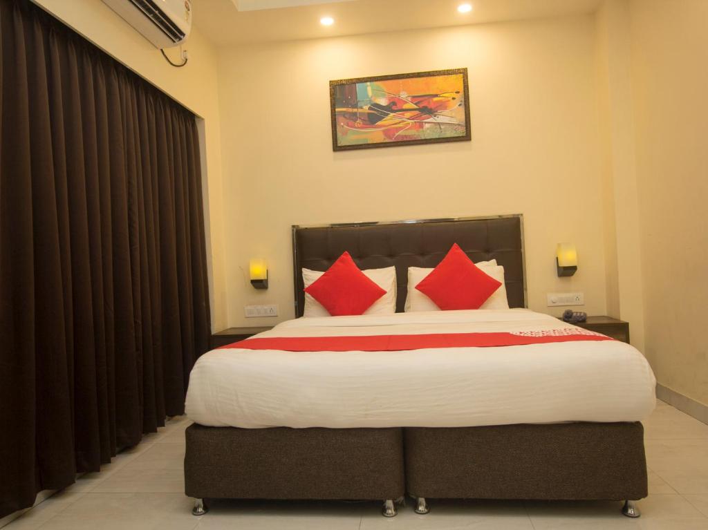 Postel nebo postele na pokoji v ubytování Hotel Mount View, Siliguri