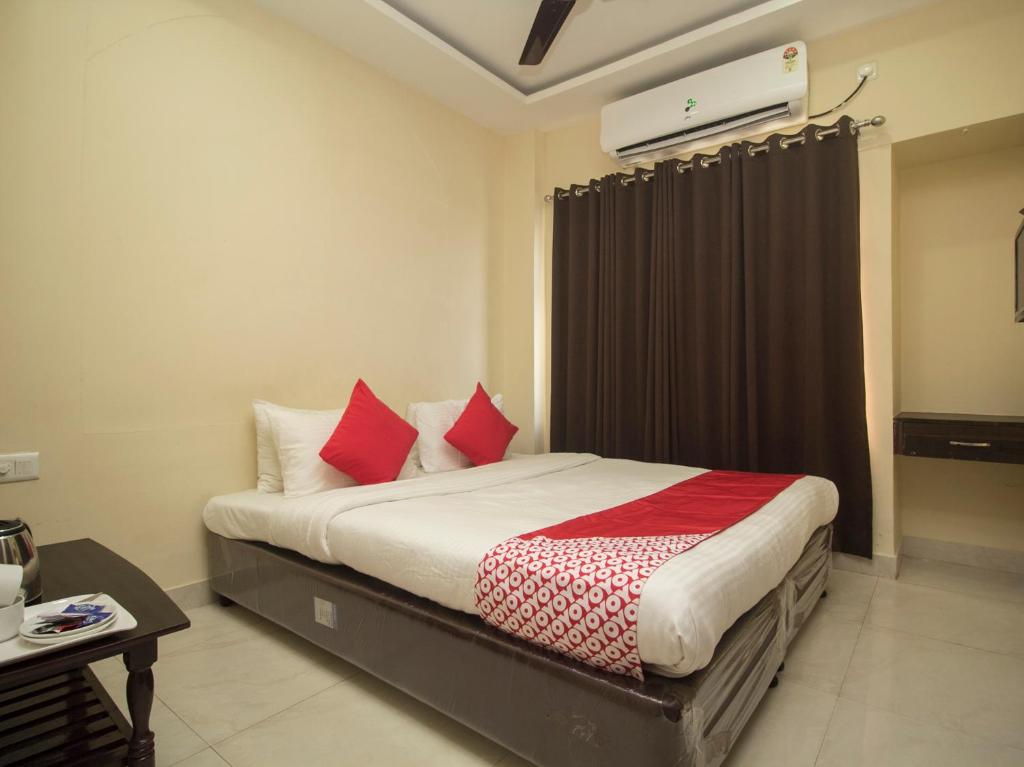 Postel nebo postele na pokoji v ubytování Hotel Mount View, Siliguri