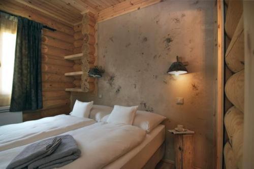 Postel nebo postele na pokoji v ubytování Chalet Ana & SPA
