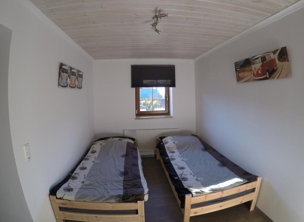 Postel nebo postele na pokoji v ubytování Haus Pistenblick