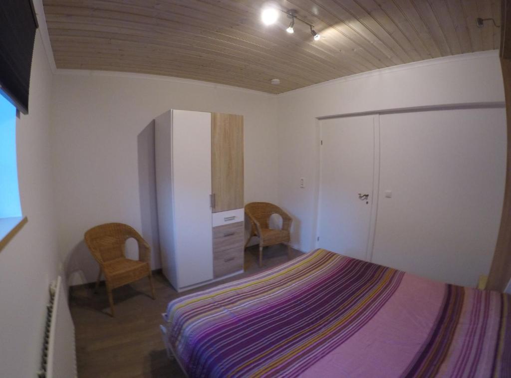 Postel nebo postele na pokoji v ubytování Haus Pistenblick