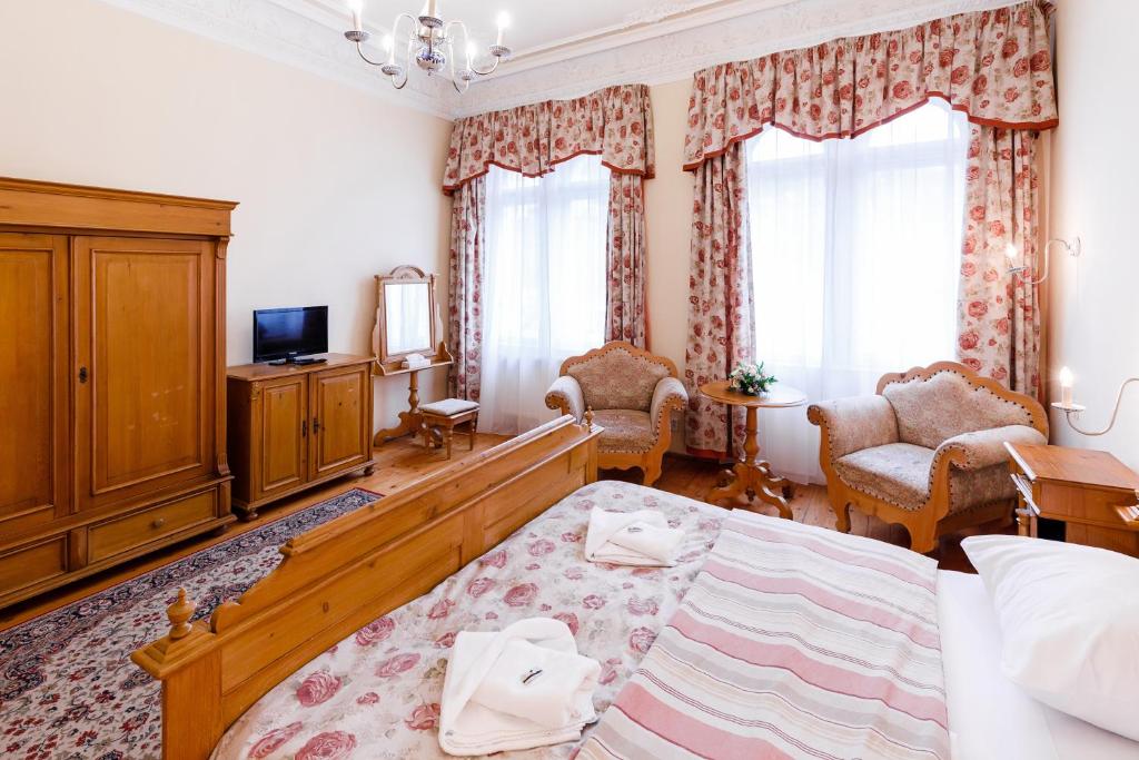 Postel nebo postele na pokoji v ubytování Hotel Heluan