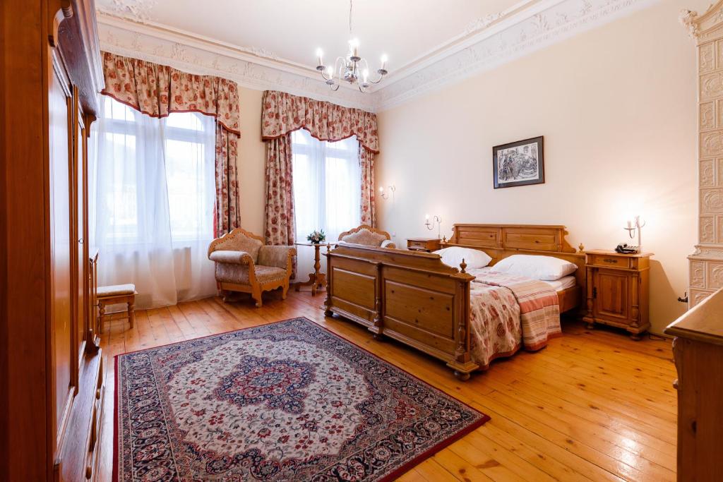 Postel nebo postele na pokoji v ubytování Hotel Heluan