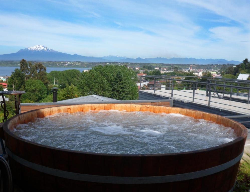 a large body of water filled with a large amount of water at Dein Haus Hotel y Departamentos in Puerto Varas