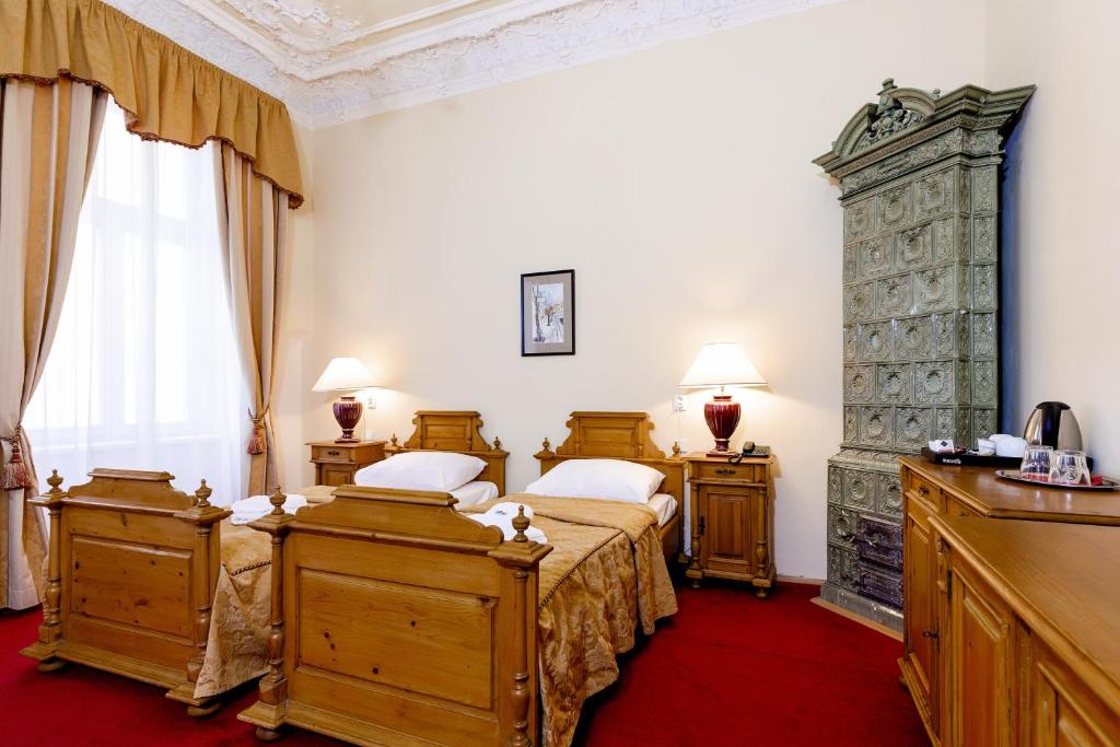 Postel nebo postele na pokoji v ubytování Hotel Heluan